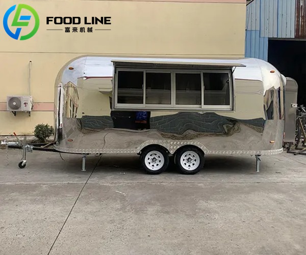food concession trailer with a brilliant mirror stainless steel exterior