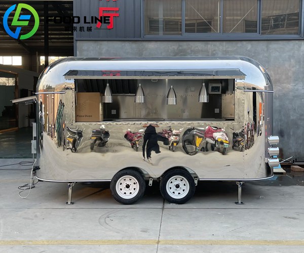 mirrored stainless steel catering trailer
