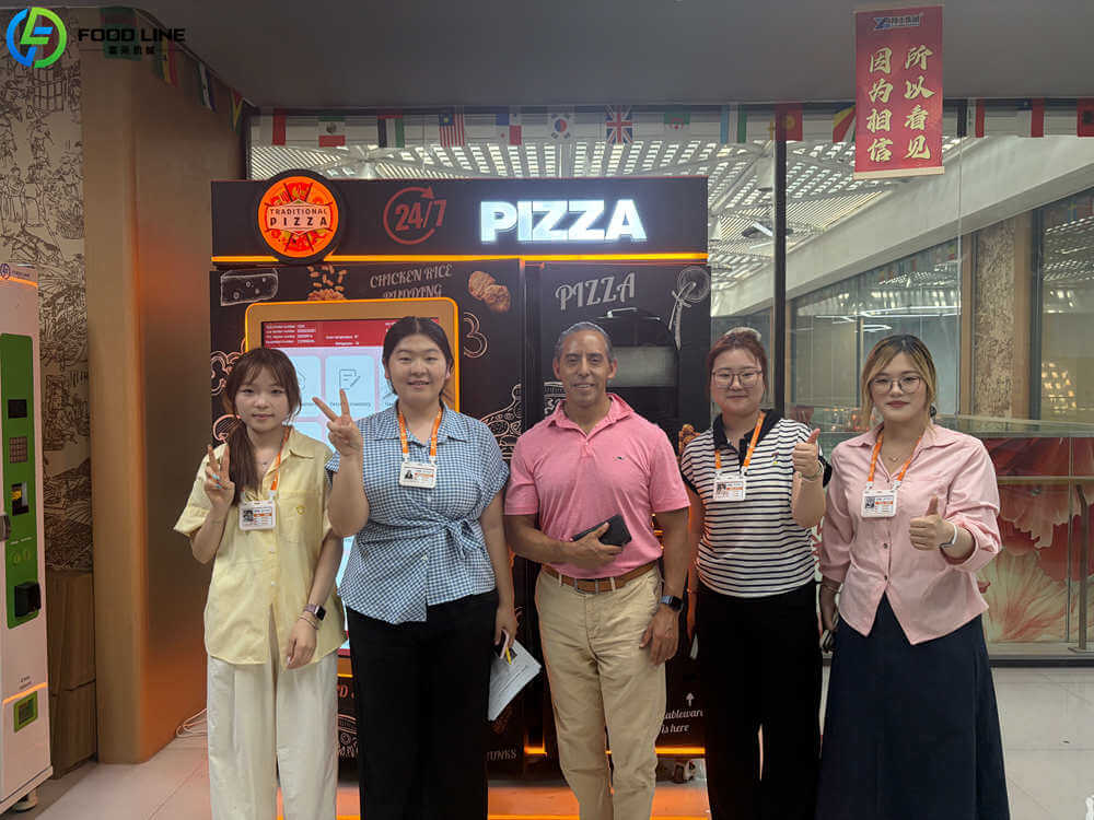 foodline sales and mexican client at pizza vending machine