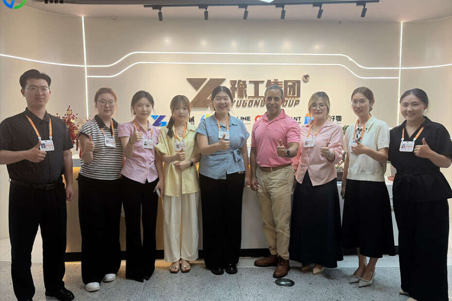 foodline sales staff take photos with mexican client