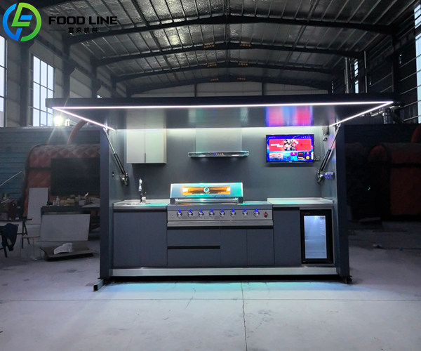 modular outdoor kitchen equipped with 32 inch tv