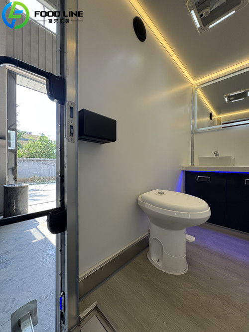 three stall portable restroom trailer with flush toilet