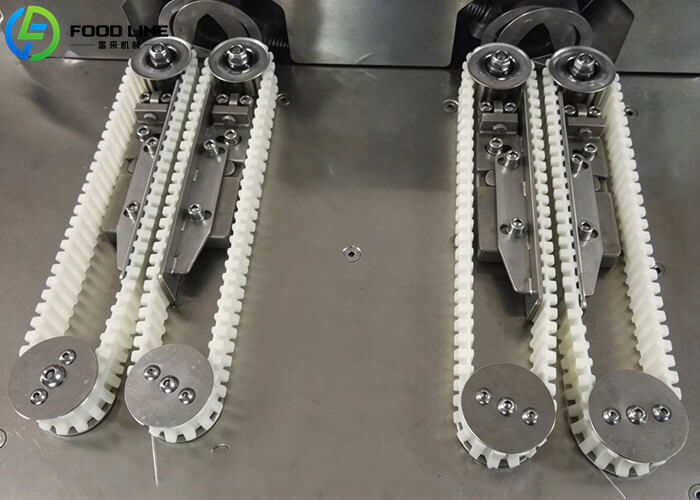double lane sausage tying mechanism